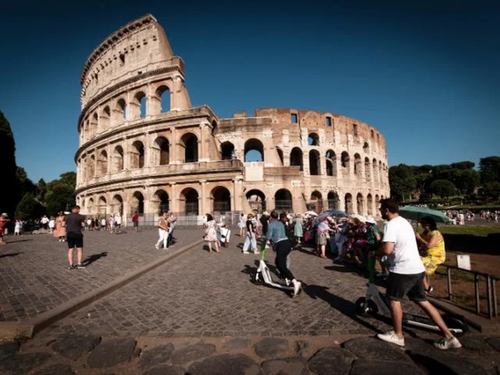 More tourists caught defacing Rome's ancient Colosseum