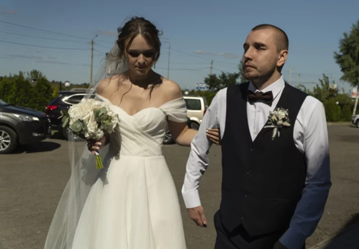 He couldn't see his wedding. But this war-blinded Ukrainian soldier cried with joy at new love