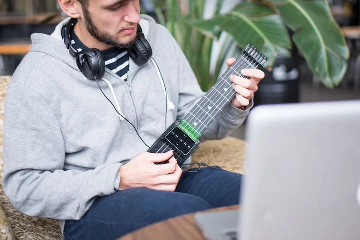Pick up a new skill with this guitar trainer on sale for $170