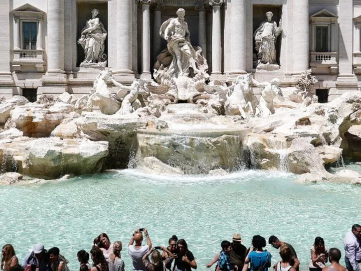 Video shows tourist climbing into Rome's Trevi Fountain to fill up water bottle