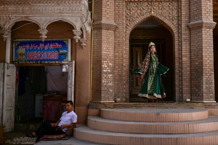 State-backed tourism booms in China's troubled Xinjiang