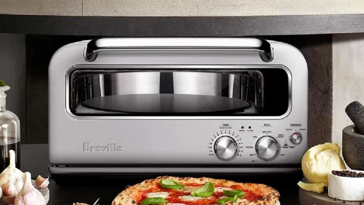 Make your perfect, wood fire-style pizza pie at home with a pizza oven for $200 off