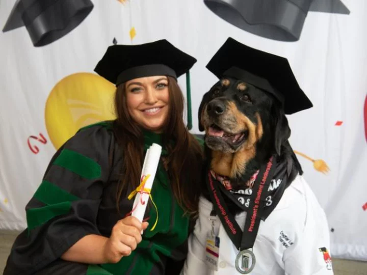 Dedicated service and therapy dogs receive honorary 'dogtorate' degrees from the University of Maryland, Baltimore
