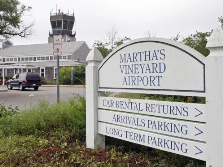 A passenger took over controls and crash landed a small plane at Martha's Vineyard Airport after the pilot suffered a medical condition, officials say