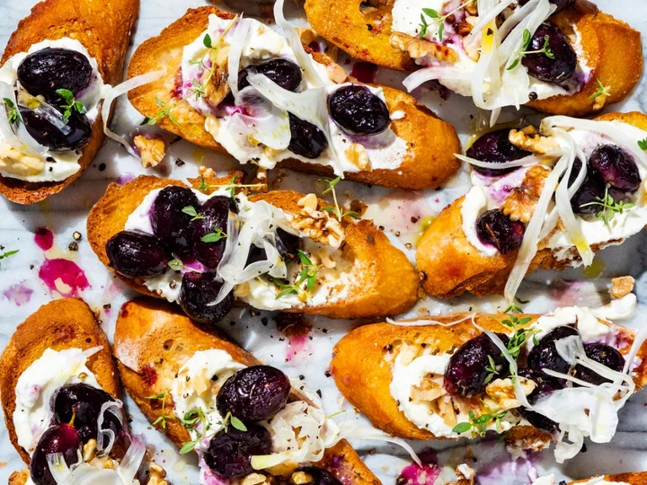Roasted grape, honey and feta crostinis are perfect dinner party canapes