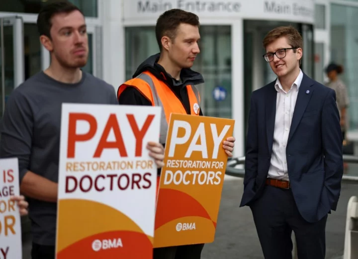 Doctors in England step up strike action over pay