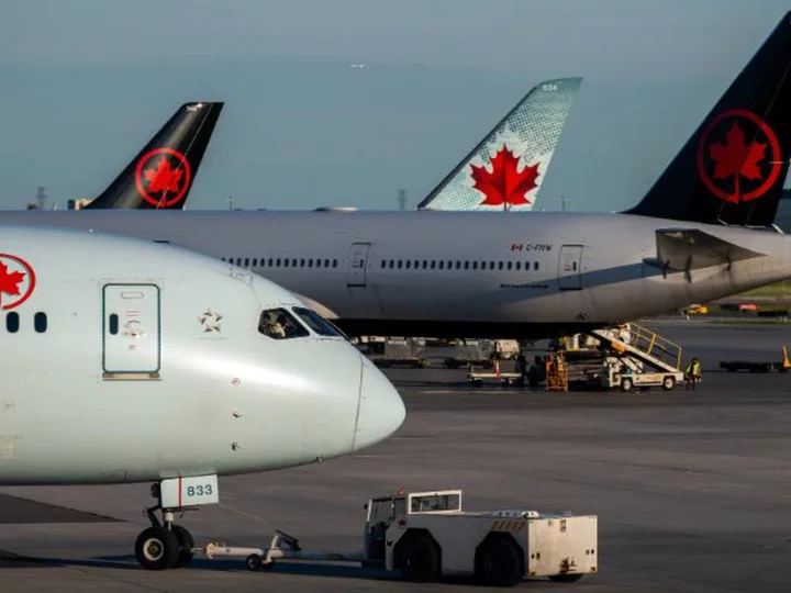 Air Canada apologizes after passengers told to sit in vomit-covered seats