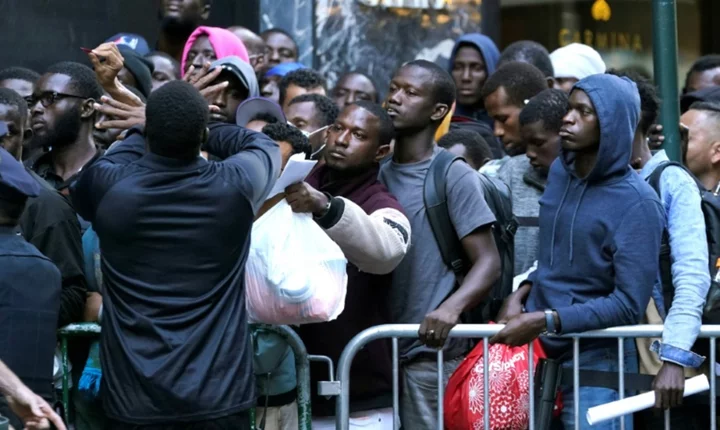 Migrants sleep outside as New York mayor says city is full